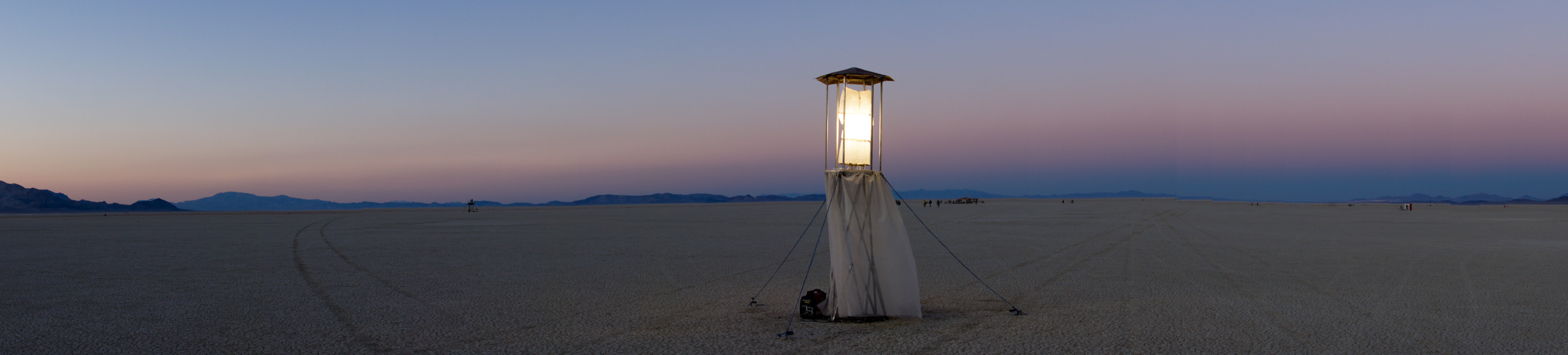 Snow QueenMy installation is a "lighthouse." The lens is a glass cast of a dress, cast in 12 parts. The tower is steel, and the skirt is chiffon that would blow beautifully in the playa wind (made by Elizabeth Serrano).
